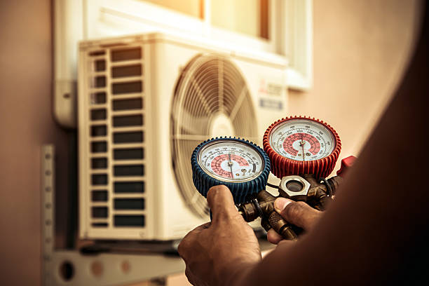 Professional Heat Pump Repair technician working in Cromwell, KY